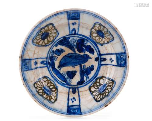 A KUBACHI UNDERGLAZE-PAINTED POTTERY DISH PERSIA, 17TH CENTU...