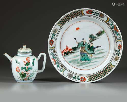 A CHINESE DOUCAI LOTUS TEAPOT AND FAMILLE VERTE DISH, KANGXI...