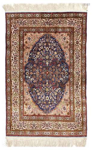 A SILK HEREKE RUG, TURKEY, 20TH CENTURY