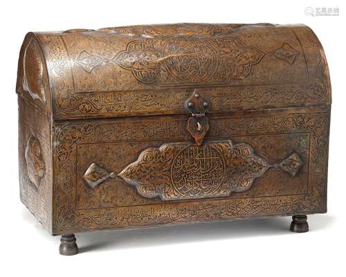 A LARGE COPPER BOX, RICHLY DECORATED WITH ARABIC CALLIGRAPHI...