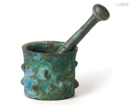 SELJUK DECORATED BRONZE PESTLE AND MORTAR, 11TH-12TH CENTURY