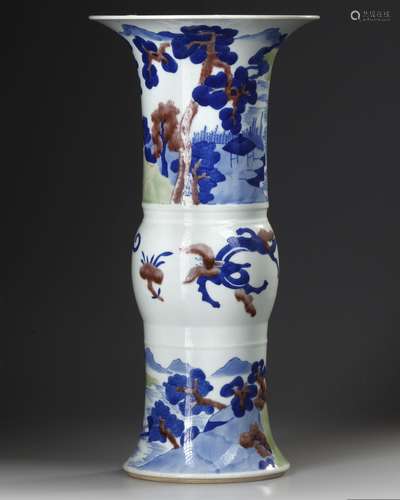 A CHINESE UNDERGLAZE BLUE, COPPER-RED AND CELADON-GLAZED CAR...