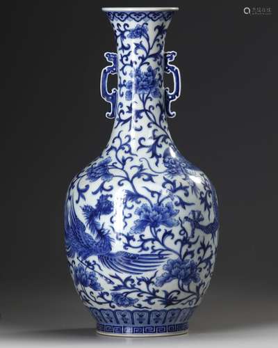 A CHINESE BLUE AND WHITE DRAGON AND PHOENIX VASE, QING DYNAS...