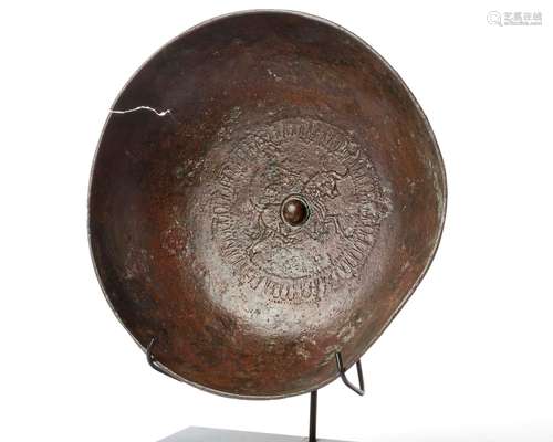 A BRONZE BOWL WITH A BULL AT ITS CENTER, URARTU PERIOD, 600-...