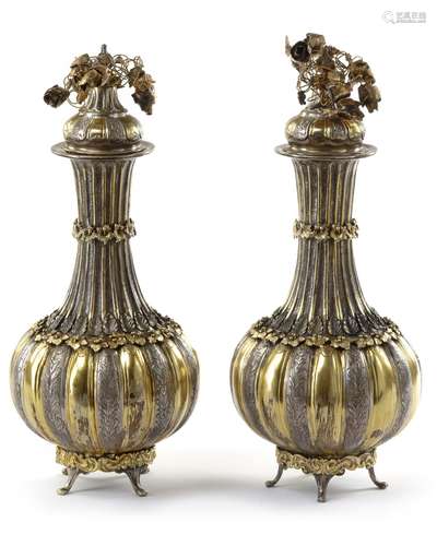 A PAIR OF GILT SILVER VASES WITH COVERS, TURKEY, 19TH CENTUR...