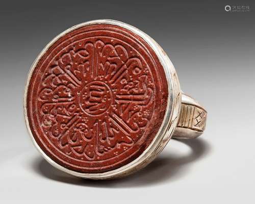 A HARDSTONE SEAL, MOUNTED AS A RING