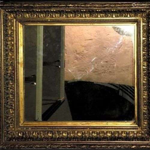 Miroir en bois doré H. 53 cm - L. 67 cm
