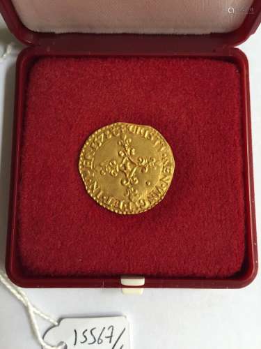 Un écu Henri III (1574-1589) en or dans un écrin. Ecu d'or a...