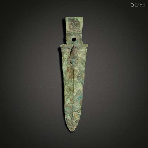 A rare archaic bronze 'taotie and cicada' dagger axe (Ge), L...