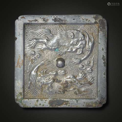A bronze 'mythical beast' square mirror, Tang dynasty | 唐 銅...