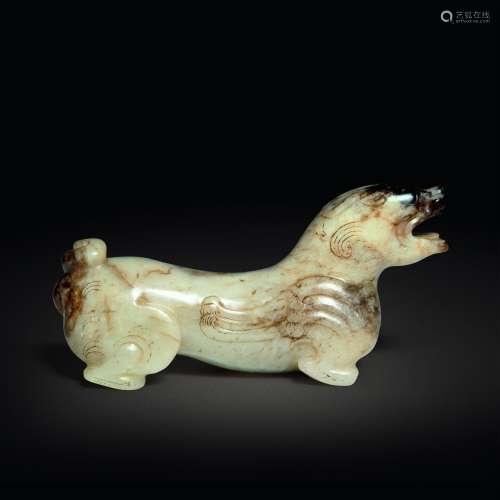 A beige and brown jade figure of a bixie, Ming dynasty or la...