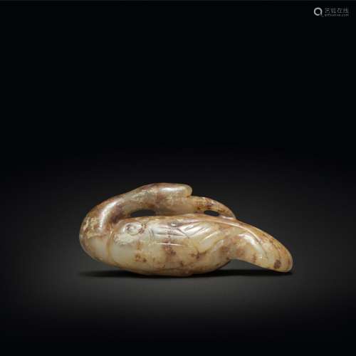 A celadon and russet jade figure of a crane, Tang / Song dyn...