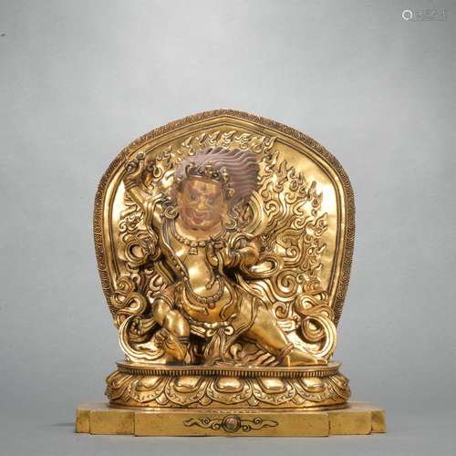 A gilt-bronze statue of Mammon