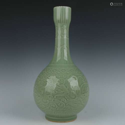 A celadon-glazed vase