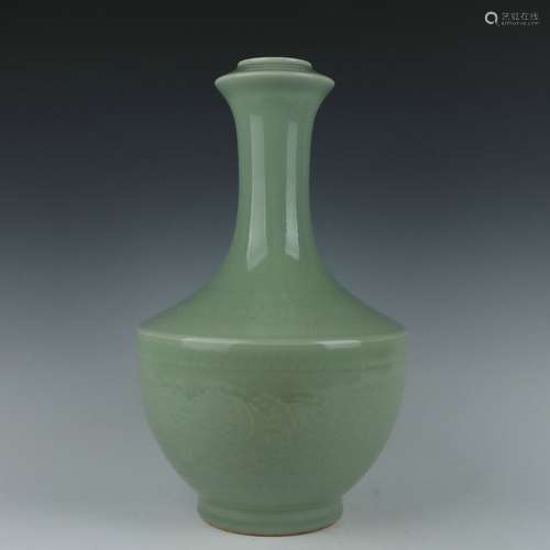 A celadon-glazed vase