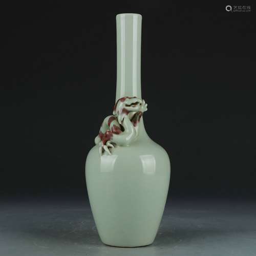 A celadon-glazed vase