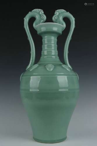 A celadon-glazed vase