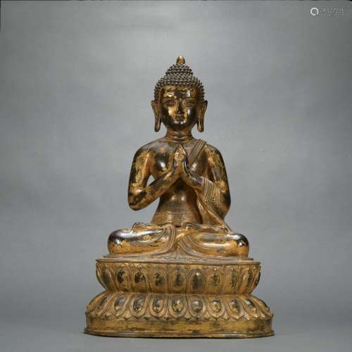 A gilt-bronze statue of Dali Tathagata