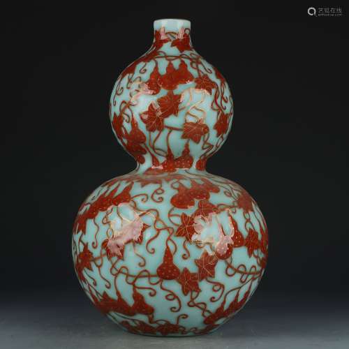 A celadon-glazed allite red glazed gourd-shaped vase