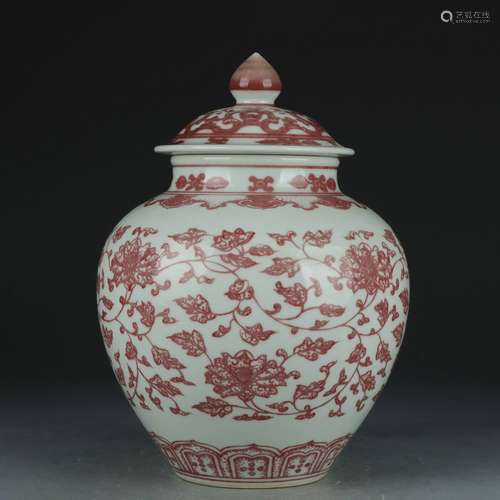 A copper-red-glazed 'floral' jar and cover