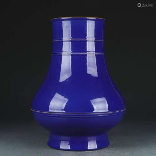 A blue glazed vase