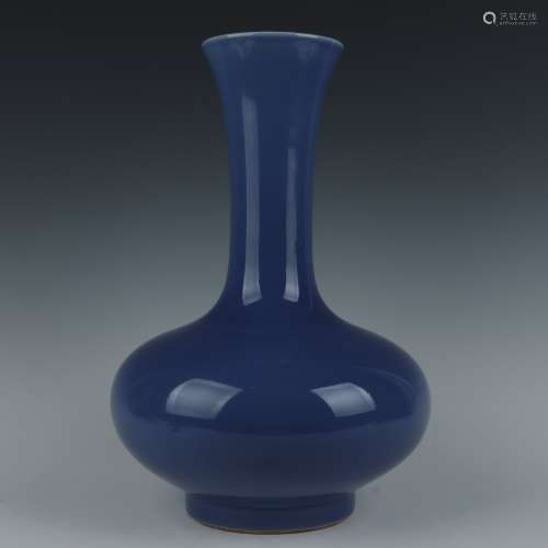 A blue glazed vase
