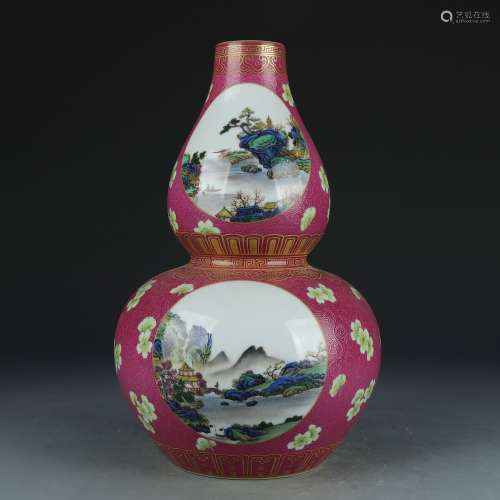 A Carmine glazed 'landscape' gourd-shaped vase