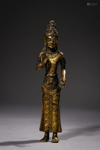 Gilt bronze statue of Achaoye Buddha standing