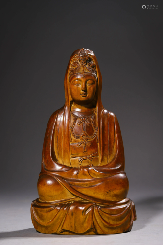 A Carved Sandalwood Seated Guanyin Statue