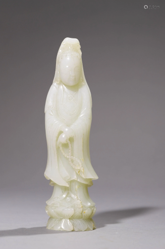 A Carved White Jade Standing Guanyin Statue