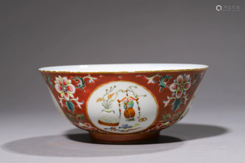 A Famille rose bowl with ancient patterns