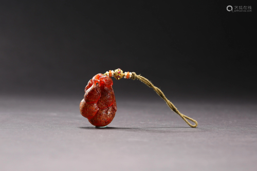 A Carved Amber Ornament