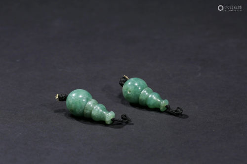 A Pair of Carved Jade Ornaments
