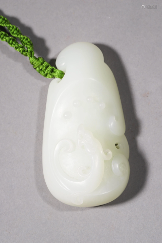A Carved White Jade Ornament