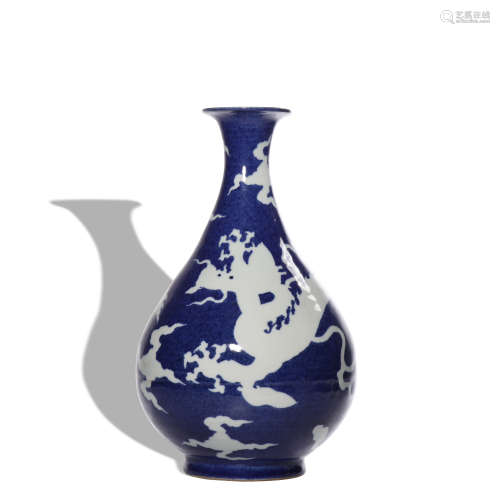 A blue glazed 'dragon' pear-shaped vase