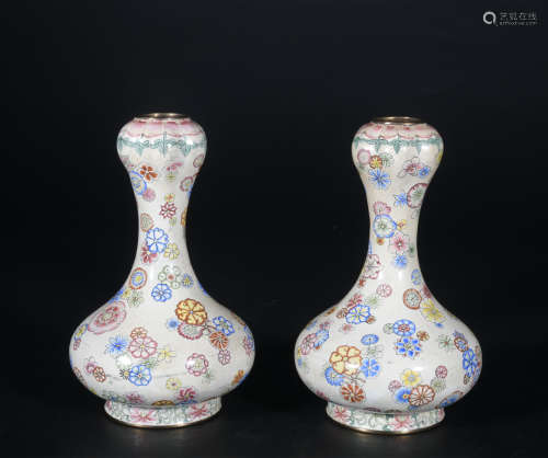 A pair of enamel 'balls' vase