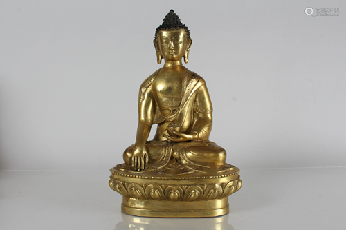 A Chinese Gilt Fortune Buddha Statue