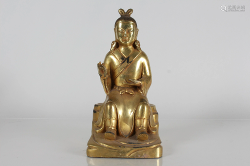 A Chinese Gilt Fortune Buddha Statue