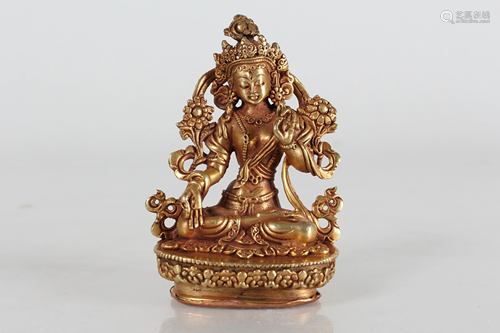 A Tibetan Gilt Religious Fortune Buddha Statue