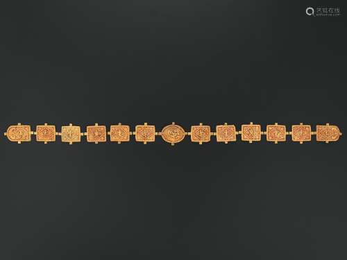 A 13-PART GOLD REPOUSSE BELT, TANG TO LIAO