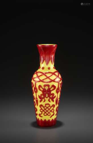 A RED-OVERLAY YELLOW GLASS 'BAJIXIANG' VASE, QING