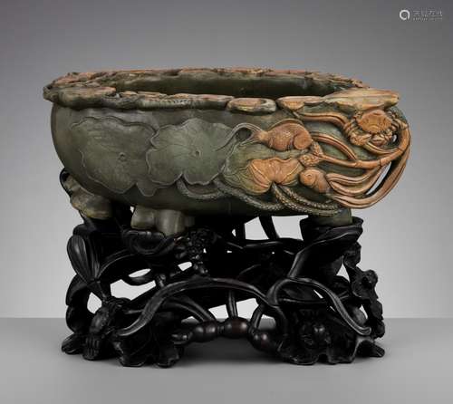 A LARGE DUAN STONE 'LOTUS POND' BASIN, QING