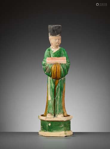 A SANCAI FIGURE OF AN ATTENDANT, MING DYNASTY