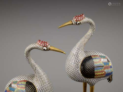 A PAIR OF CLOISONNE FIGURES OF CRANES, QING
