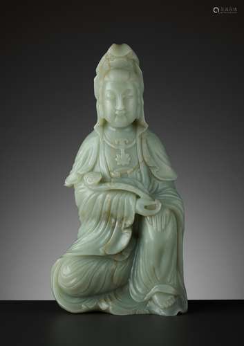 A MASSIVE CELADON JADE FIGURE OF GUANYIN, QING