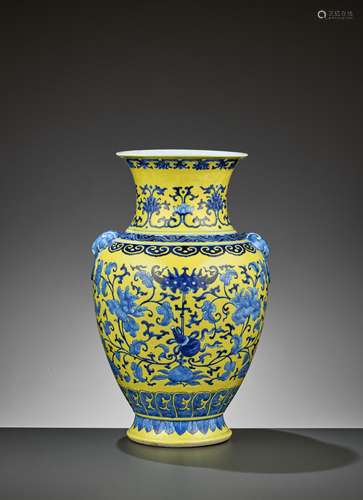 A YELLOW-GROUND 'AUSPICIOUS' HU VASE, QING