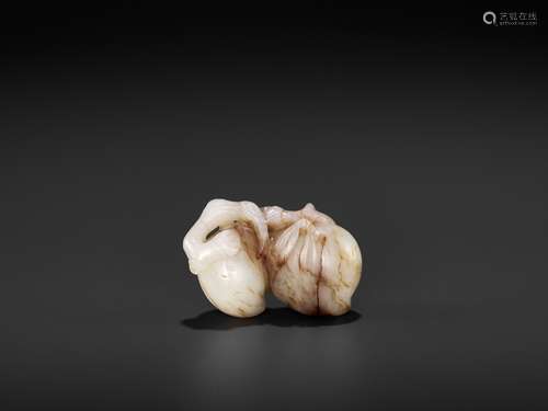 A 'DOUBLE PEACH' JADE PENDANT, MING DYNASTY