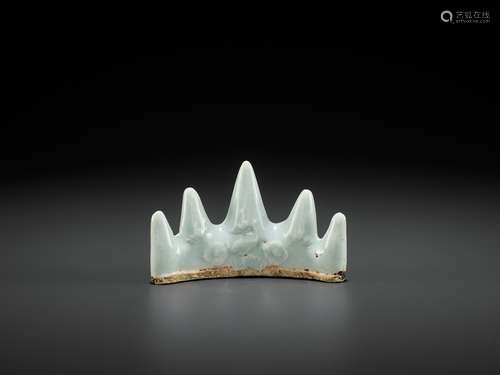 A MOLDED QINGBAI BRUSH REST, SOUTHERN SONG-YUAN