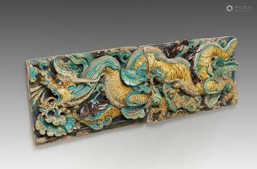 A LARGE FAHUA 'DRAGON' GLAZED POTTERY TILE, MING