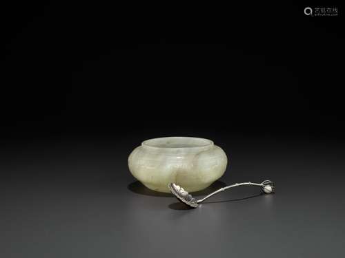 AN 'ARCHAISTIC' JADE WASHER, EARLY QING DYNASTY